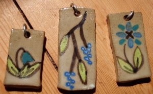 Handpainted stoneware pendants